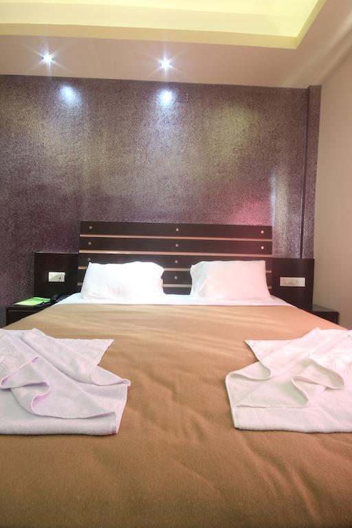Urmee Hotel Бхубанешвар Стая снимка