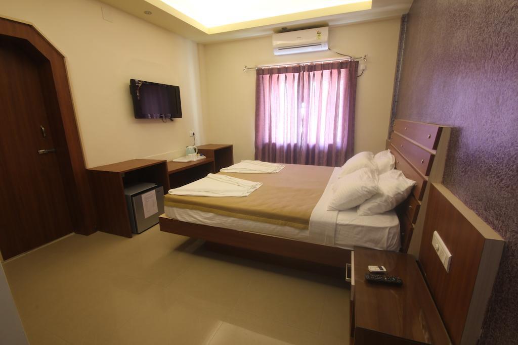 Urmee Hotel Бхубанешвар Стая снимка