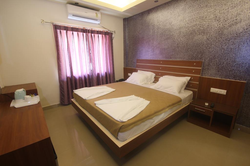 Urmee Hotel Бхубанешвар Стая снимка