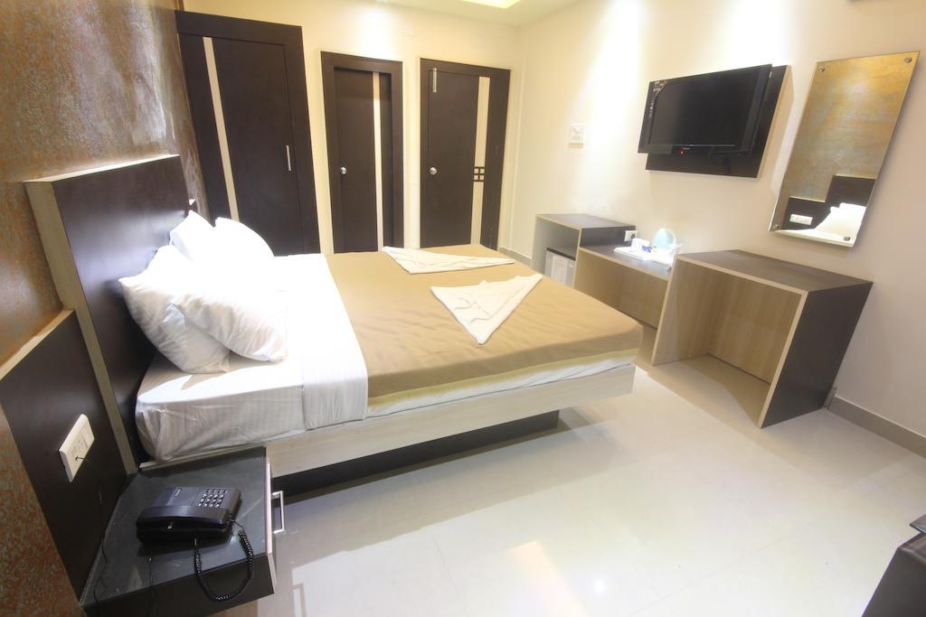 Urmee Hotel Бхубанешвар Стая снимка